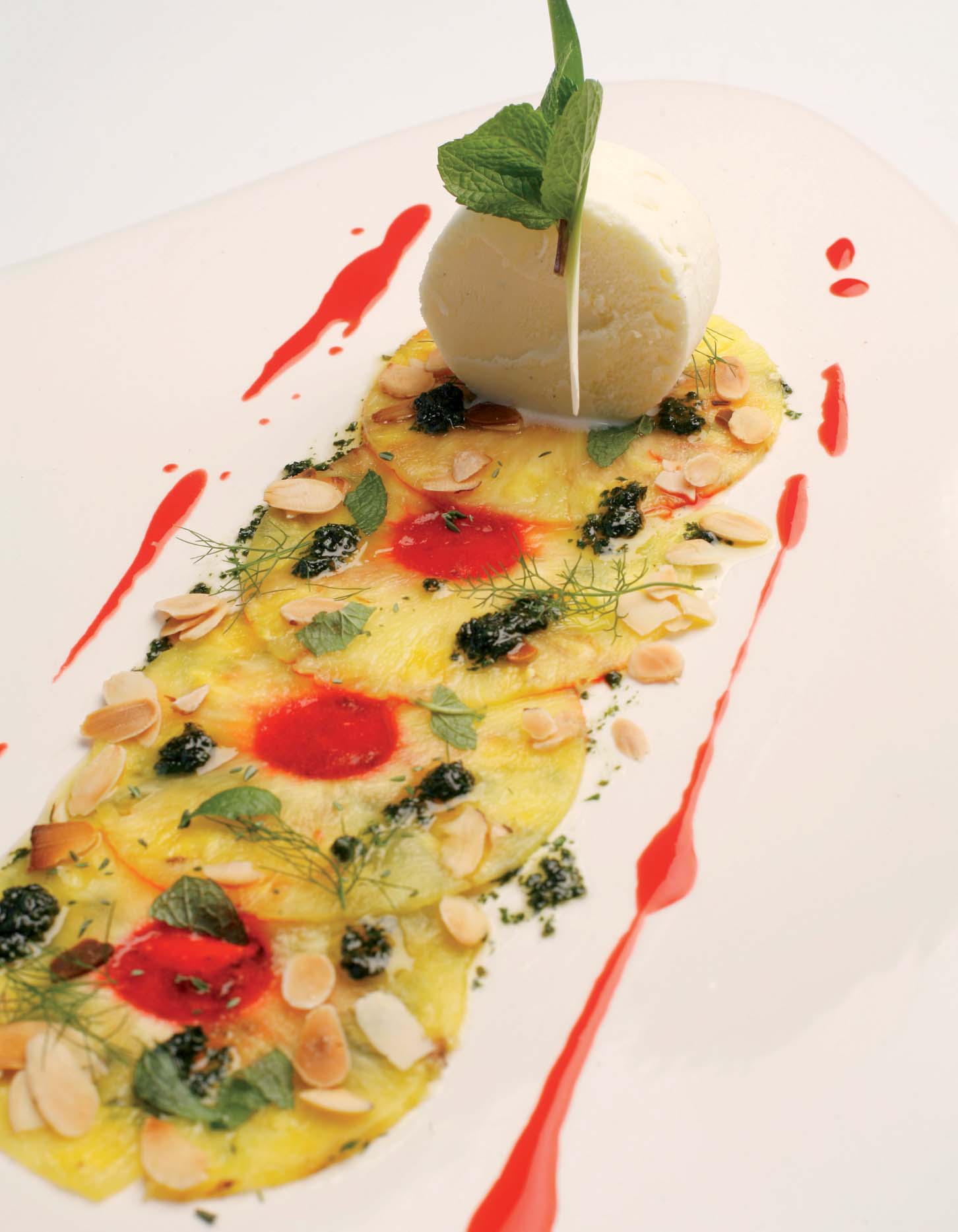 Tropical pineapple carpaccio with Mallorcan olive oil and almond parfait - Recipes - Gastronomy - Balearic Islands - Agrifoodstuffs, designations of origin and Balearic gastronomy
